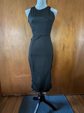 Classic Black Sleeveless Sheath Dress